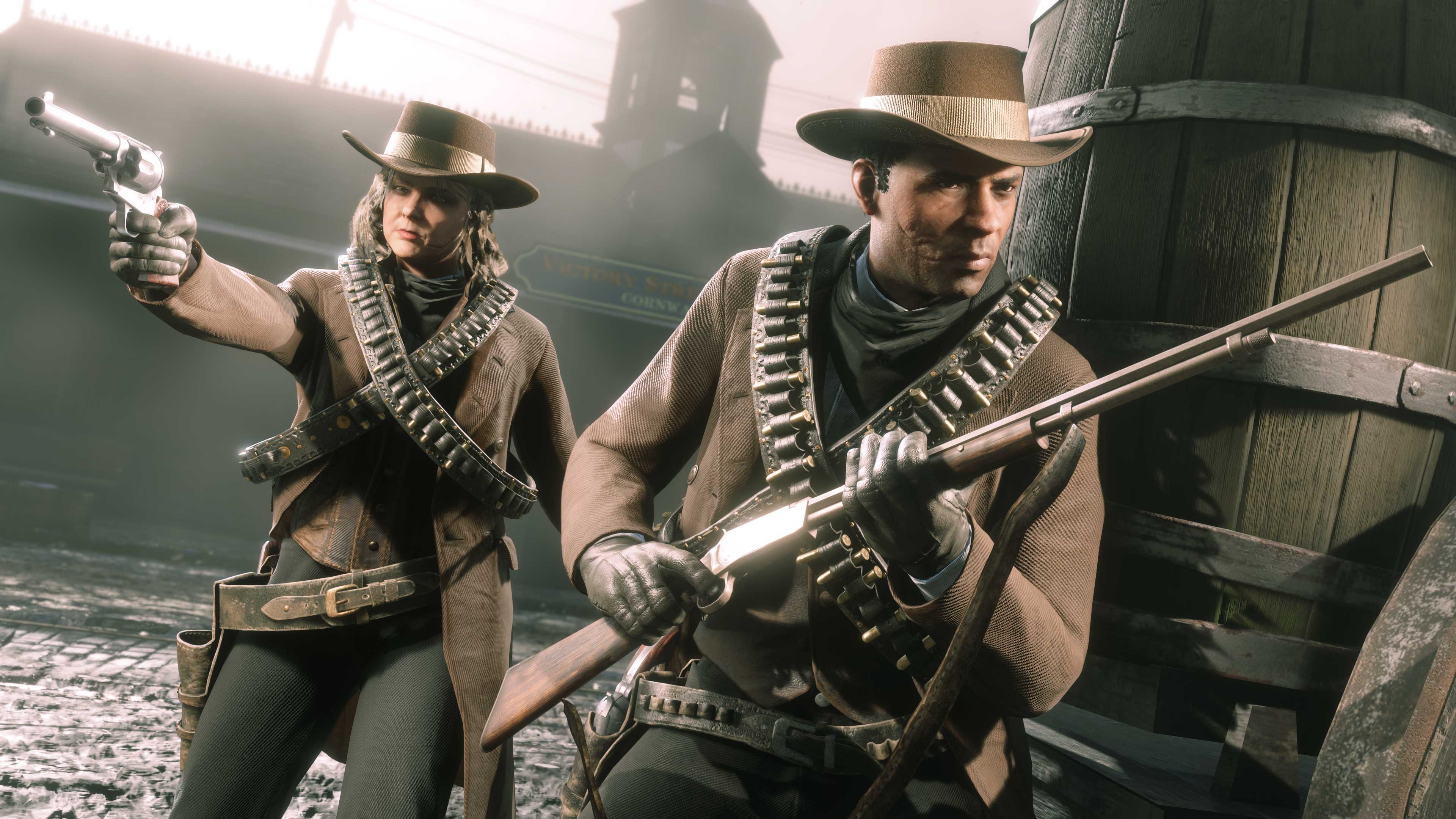2 Red Dead Online players taking cover behind barrels looking ready için combat