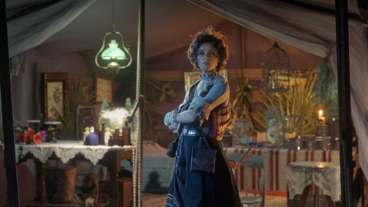 Harriet Davenport stands near her tent